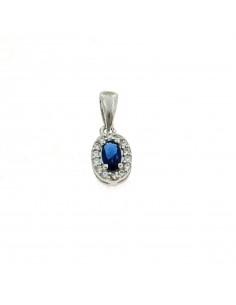 Blue oval zircon pendant 6x8 mm. on a white gold plated base with white zircons frame in 925 silver