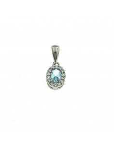 Aquamarine oval zircon pendant 6x8 mm. on a white gold plated base with white zircons frame in 925 silver