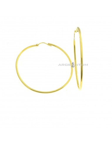 Tubular circle earrings ø 75 mm. yellow gold plated in 925 silver