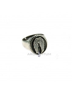 Adjustable oval shield ring with central wings in 925 burnished silver