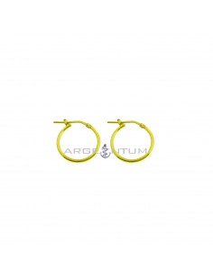Tubular hoop earrings ø 18 mm with yellow gold plated snap closure in 925 silver