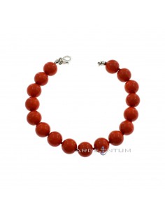 Coral paste spheres bracelet ø 10 mm inserted in knots with 925 silver lobster clasp