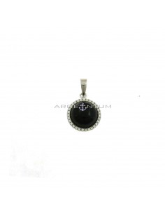 Round pendant of black onyx cabouchon in a frame of white zircons plated white gold in 925 silver