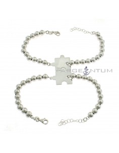 Ball bracelets with central divisible puzzle tiles in white gold plated 925 silver