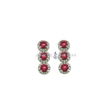 Lobe earrings with red zircons in white gold plated white zircon frames in 925 silver