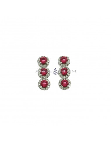 Lobe earrings with red zircons in white gold plated white zircon frames in 925 silver