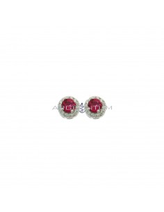 Lobe earrings ø 6 mm with central round red zircon in a frame of white zircons plated white gold in 925 silver