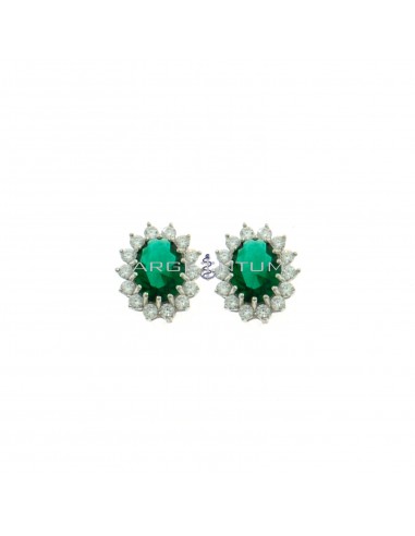 Lobe earrings 10.5x13 mm with central oval green zircon in a frame of white zircons plated white gold in 925 silver