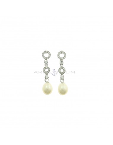 Pendant earrings with round shapes degradè white zircon alternating with points of light and oval pearl plated white gold in 925 silver