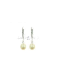 Pendant earrings with rigid wand attachment with 3 white zircons and oval pearl plated white gold in 925 silver
