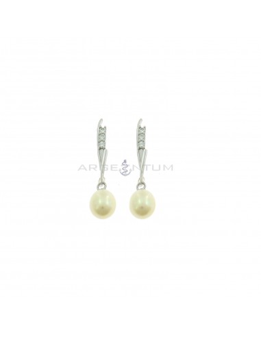Pendant earrings with rigid wand attachment with 3 white zircons and oval pearl plated white gold in 925 silver