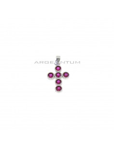 Cross pendant with red zircons in white gold plated dotted settings in 925 silver