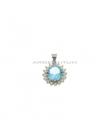 Round blue zircon pendant ø 12 mm. on a white gold plated base with a white zircon jaws frame in 925 silver