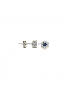 Flower lobe earrings with blue central zircon and white gold plated white zircon petals in 925 silver