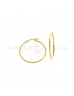 Tubular hoop earrings ø 33 mm with yellow gold plated snap closure in 925 silver