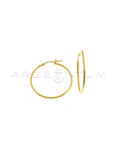 Tubular hoop earrings ø 33 mm with yellow gold plated snap closure in 925 silver