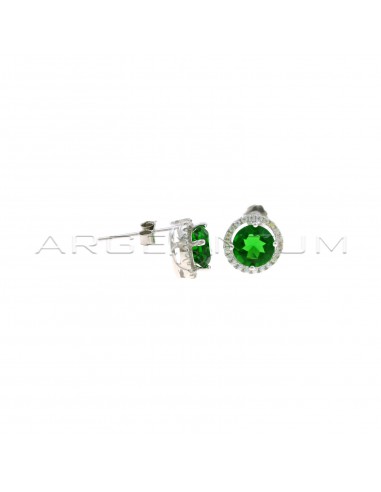 Lobe earrings ø 9.5 mm with central round green zircon in a frame of white zircons plated white gold in 925 silver