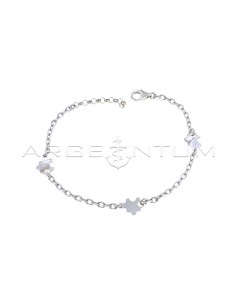 Forced mesh bracelet with white gold plated puzzle pieces in 925 silver