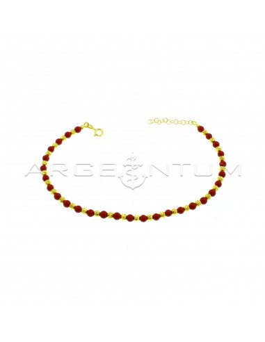 Anklet with diamond spheres and yellow gold plated coral paste spheres in 925 silver
