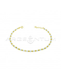 Anklet with diamond spheres and white agate spheres plated with yellow gold in 925 silver