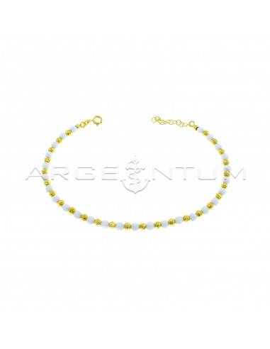Anklet with diamond spheres and white agate spheres plated with yellow gold in 925 silver