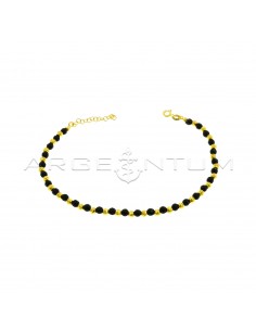 Anklet with diamond spheres and faceted onyx spheres yellow gold plated in 925 silver