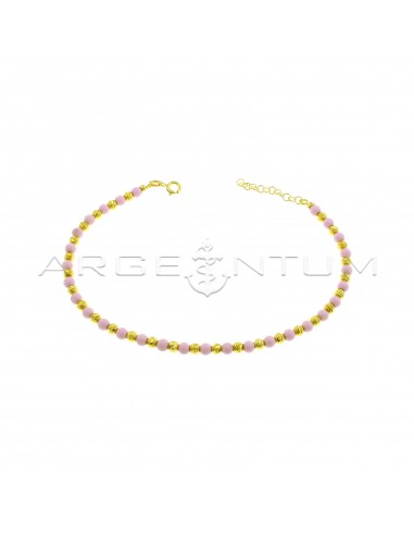 Anklet with diamond spheres and spheres in pink coral paste, yellow gold plated in 925 silver