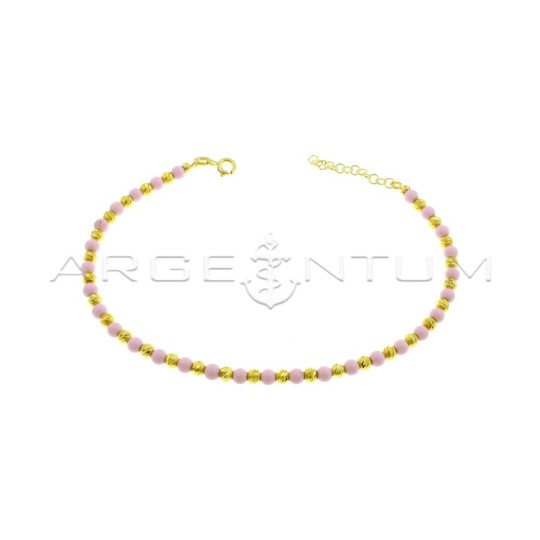 Cavigliera a sfere diamantate e sfere in pasta di corallo rosa placcata oro giallo in argento 925