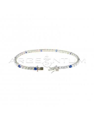 White gold plated tennis bracelet with 5 white and 1 blue 3 mm zircons in 925 silver