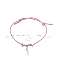 Pink cord bracelet with slip knots, hammered nuggets and white gold plated horn pendant in 925 silver