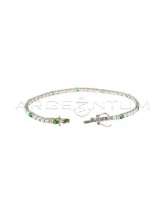White gold plated tennis bracelet with 5 white and 1 green 3 mm zircons in 925 silver