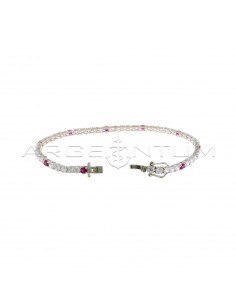White gold plated tennis bracelet with 5 white and 1 red zircons of 3 mm in 925 silver