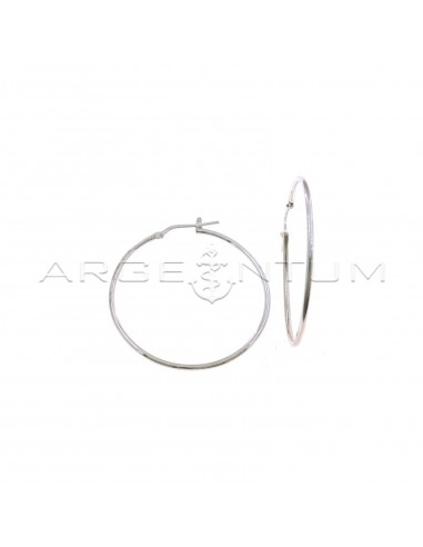 Tubular circle earrings ø 38 mm with white gold plated bridge clasp in 925 silver