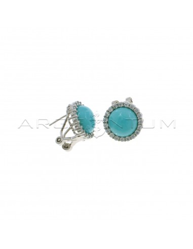 Lobe earrings with round turquoise paste stone in a white zircon frame with white gold plated pin attachment and clip in 925 silver