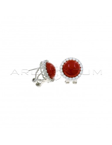 Lobe earrings with round coral paste stone in a white zircon frame with white gold plated pin and clip attachment in 925 silver