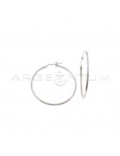White gold plated tubular hoop earrings with bridge clasp in 925 silver