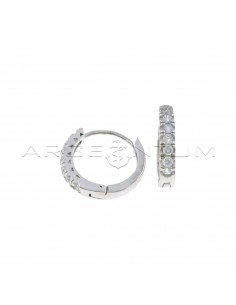 Hoop earrings with white zircons with white gold plated snap closure in 925 silver