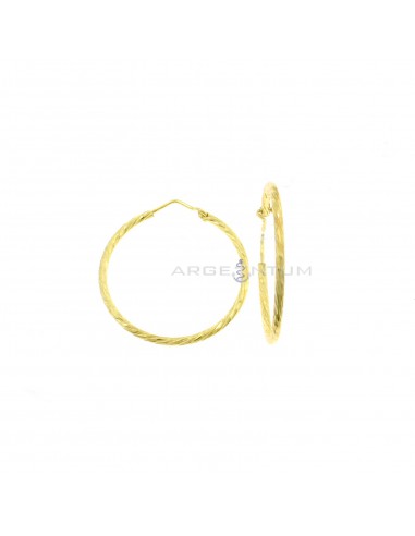 Cross tubular diamond earrings ø 35 mm with yellow gold plated bridge clasp in 925 silver