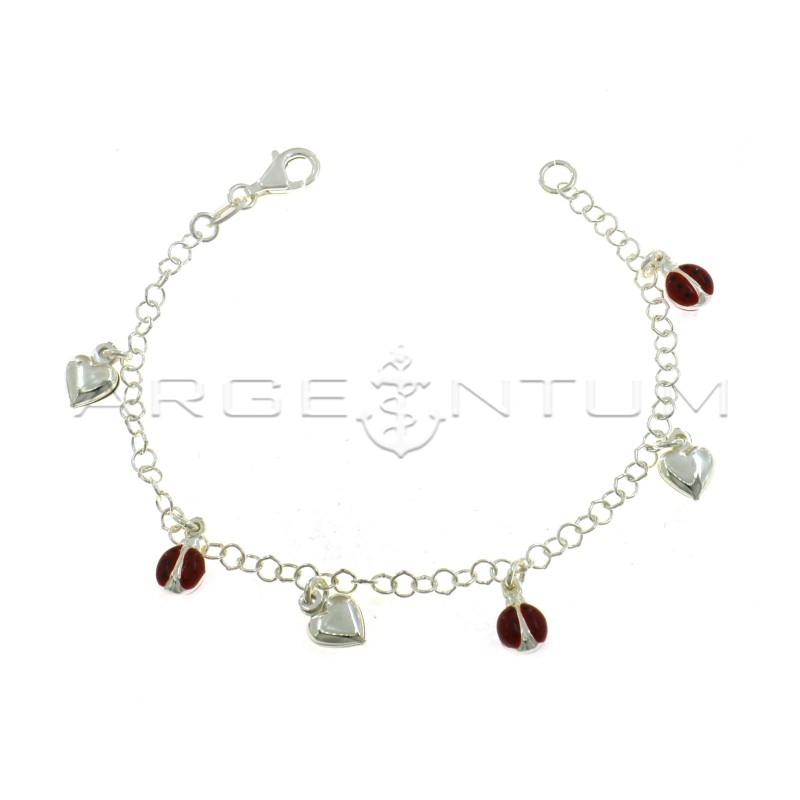 Bracciale maglia giotto con pendenti accoppiati coccinelle smaltate alternate a cuori lisci in argento 925