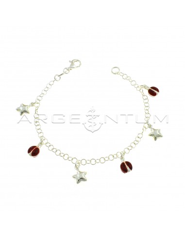 Giotto mesh bracelet with paired pendants enameled ladybugs alternating with smooth stars in 925 silver