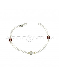 Giotto mesh bracelet with coupled side enamelled ladybugs and central coupled heart in 925 silver