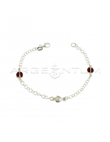Giotto mesh bracelet with coupled side enamelled ladybugs and central coupled heart in 925 silver