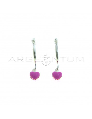 Tubular hoop earrings with bridge closure and paired pink enameled pendant heart in 925 silver