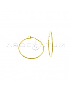 Tubular hoop earrings ø 38 mm with yellow gold plated bridge clasp in 925 silver