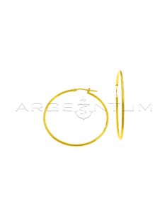Tubular hoop earrings ø 42 mm with yellow gold plated bridge clasp in 925 silver