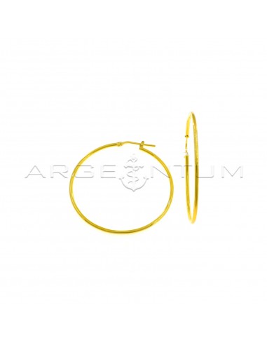 Tubular hoop earrings ø 42 mm with yellow gold plated bridge clasp in 925 silver
