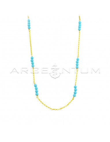 Diamond-coated rolò necklace with yellow gold plated turquoise paste spheres in 925 silver