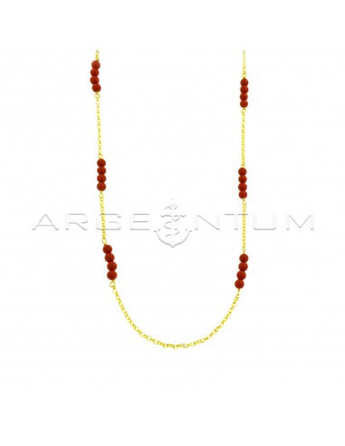 Diamond-coated rolò link necklace with red coral paste spheres plated with yellow gold in 925 silver