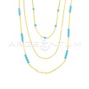 Collana a 3 fili maglia grumettina e maglia rolò diamantata con sfere in pasta di turchese placcata oro giallo in argento 925