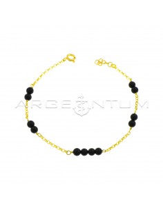Diamond-coated rolò mesh bracelet with yellow gold plated black onyx spheres in 925 silver